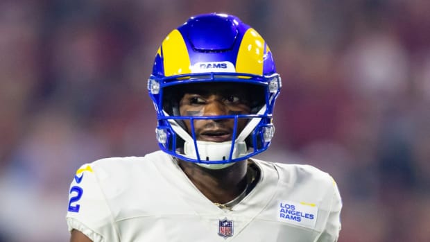 Rams wide receiver Van Jefferson runs onto the field during a game.